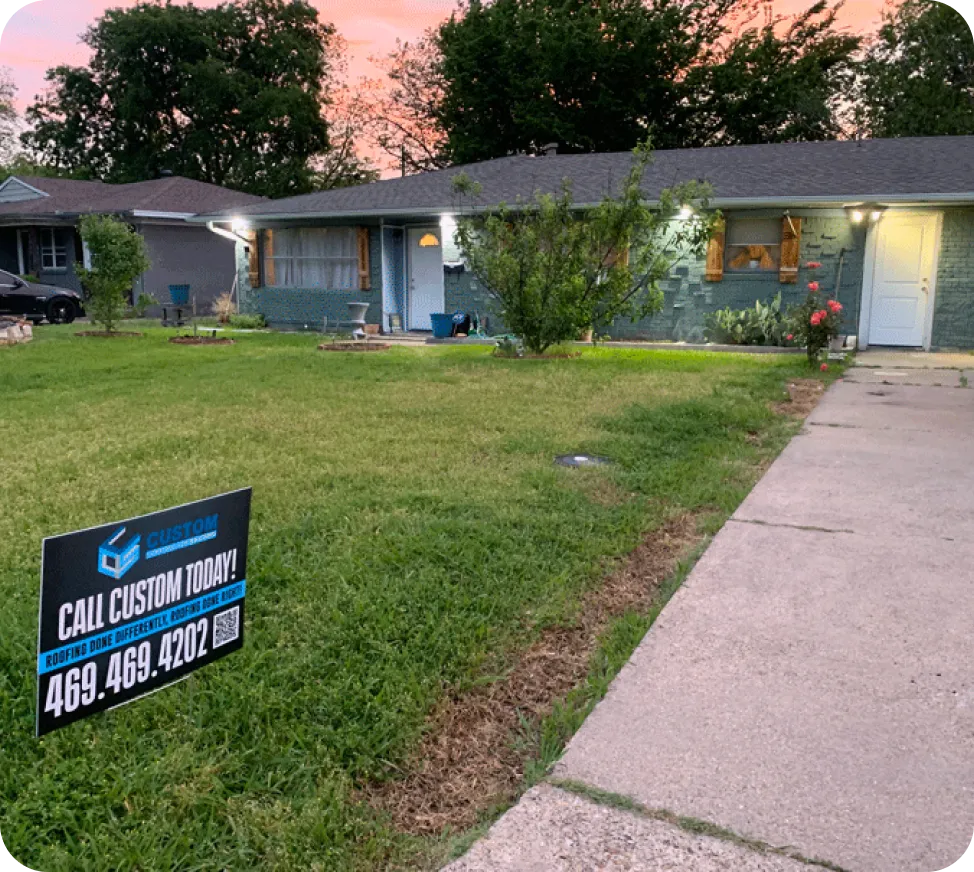 Front lawn with Custom Construction yard sign.
